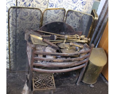 Fire furniture to include an early 20th Century brass fender, smaller example and folding fireguard, a brass log bin, footman