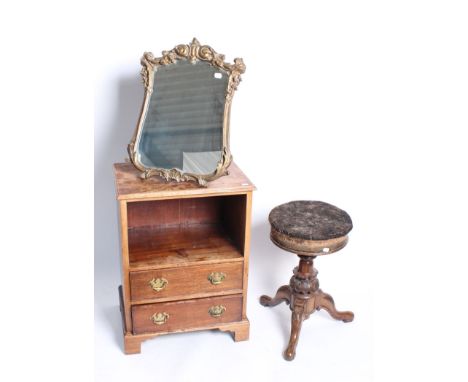 A Victorian carved walnut piano stool with an adjustable top, together with a giltwood dressing mirror and a mahogany bedside