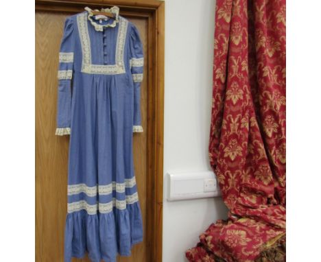 A 1970s Romantic Shepherdess full length dress by Earlybird, London, lace yolk, wide button cuff detail and leg of mutton sle