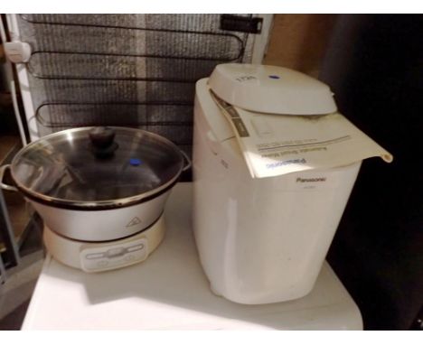 Panasonic bread maker and Fresh Tech mixer. All electrical items in this lot have been PAT tested for safety and have passed.