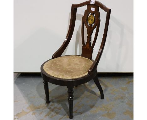 An Edwardian inlaid walnut salon chair, more recently upholstered (as previous lot), with swept and pierced backrest displayi