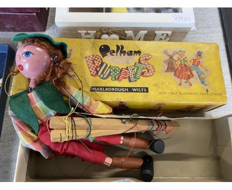 A boxed Pelham Puppet Cowgirl 