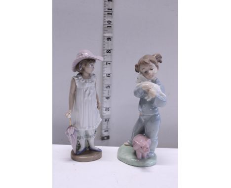 Two Nao figurines 