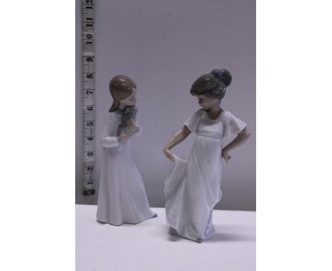 Two Nao figurines 