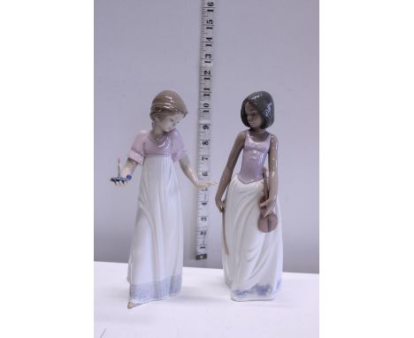 Two Nao figurines 