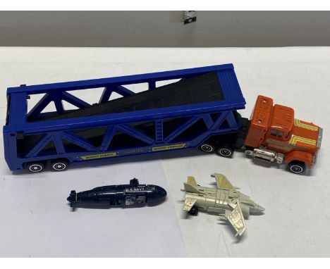 A selection of 1980's transforming robot toys 