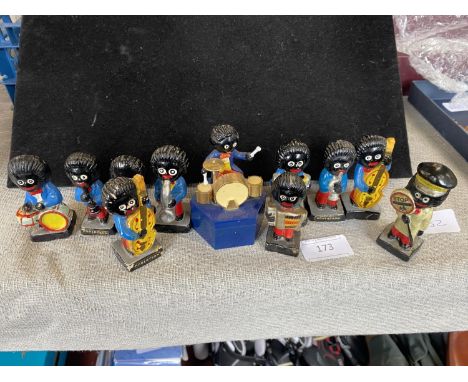 A eleven piece vintage Robertson's band and one other Robertson's figure 