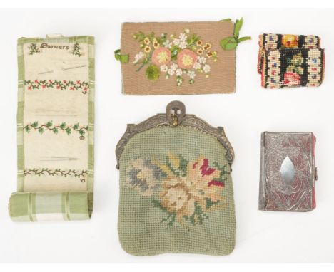 * Sewing. An embroidered silk roll needlecase, early 19th century, hand-stitched chequered green silk roll, lined inside with