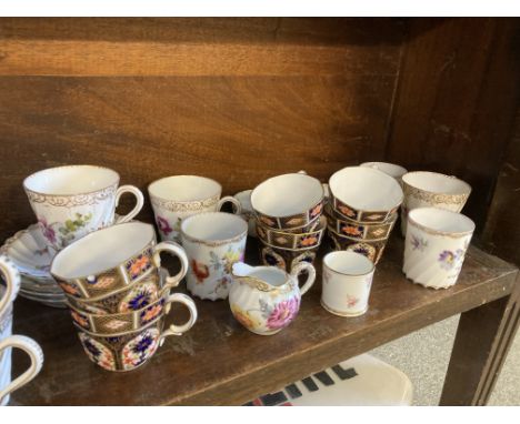 * Royal Crown Derby. A Royal Crown Derby 'Imari' porcelain tea service, comprising 6 teacups and 6 saucers (one saucer is a d