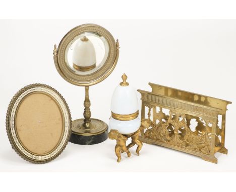* Inkwell. A French inkwell, 19th century, three gilt metal putto supporting a milk glass inkwell and cover, the top loose, 2
