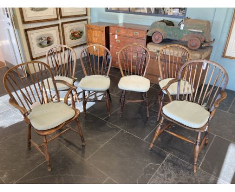 * Chairs. A set of six elm stick back chairs, 19th century, comprising two carvers and four side chairs, each with a solid se