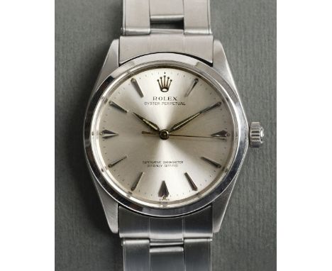 * Rolex. A Rolex Oyster Perpetual stainless steel unisex wristwatch, serial number 863691 (1985), the 30 mm diameter silvered