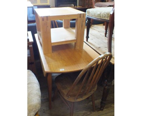 Two stick back chairs, a light Oak coffee table and a flap leaf kitchen table