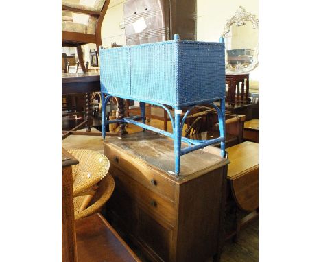 An Oak two drawer two door sideboard and blue painted loom cot and tin trunk