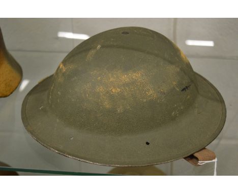 A military tin helmet.