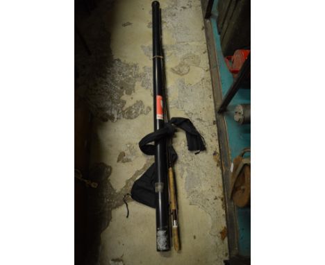 A Century Eliminator three piece fly fishing rod with storage tube.