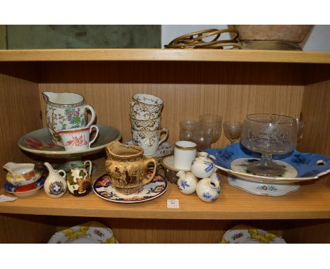 A collection of decorative china and glassware.