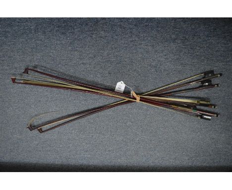 A quantity of violin bows.