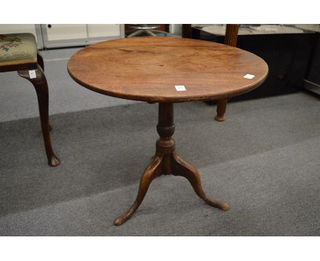 A 19th century mahogany tripod table.