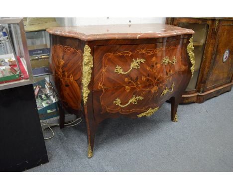A good French design Bombay marquetry commode with rouge marble top and ormolu mounts.
