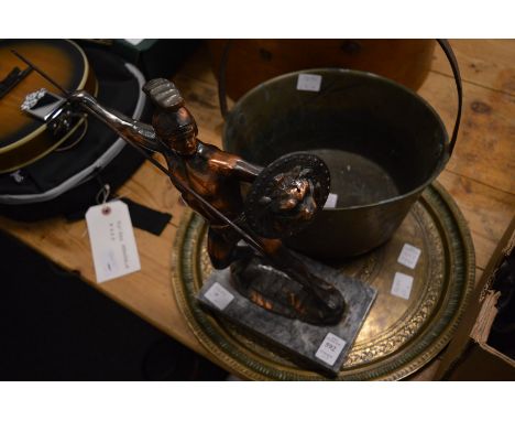 Cast metal model of a centurion, an Eastern brass charger and a brass preserve pan.