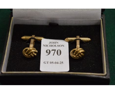 A pair of 9ct gold knot cufflinks.