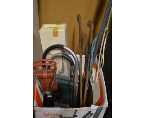 Old golf clubs, shooting stick etc.