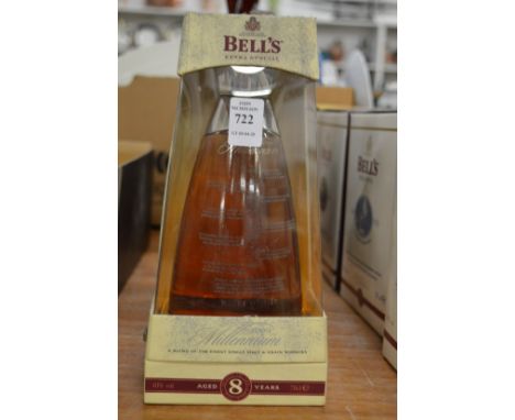 A Bells millennium whisky decanter, boxed.
