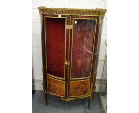 A decorative mahogany ormolu and painted two door standing vitrine cabinet (lacking one glazed section).