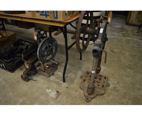 A large cast iron bench drill and two other similar.