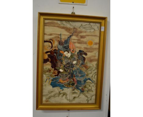 A Chinese tile picture depicting a warrior on horseback.
