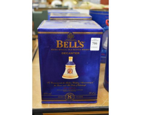 A Wade Bells whisky decanter to commemorate the Golden Wedding Anniversary of The Queen and Duke of Edinburgh, boxed.