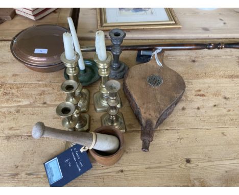 Two pairs of brass Candlesticks, another brass Candlestick, a pewter Candlestick, a pewter Chamberstick, a pair of oak Bellow