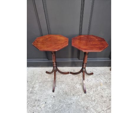 A pair of mahogany octagonal tripod tables, 40.5cm wide.