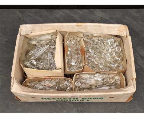 A collection of assorted cut glass lustre drops and chandelier fittings. 