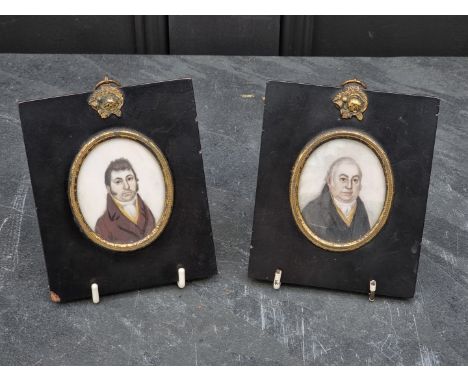British School, early 19th century, two head and shoulders portrait miniatures of gentlemen, on ivory, 6.2 x 5.1cm oval. (2)&