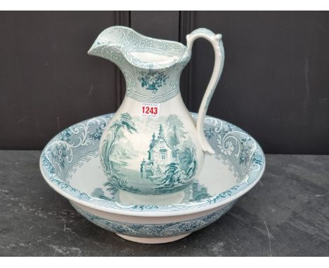 A Victorian pottery jug and basin, the jug 32cm high.