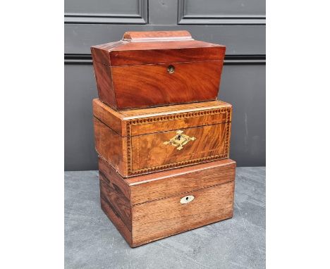 A Victorian rosewood toilet box, 30cm wide; together with a 19th century mahogany sarcophagus tea caddy, 30.5cm wide; and ano