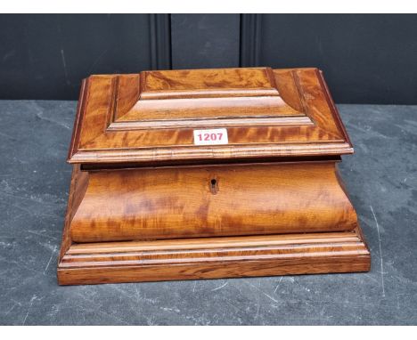 A 19th century mahogany bombe form tea caddy, 31cm wide.