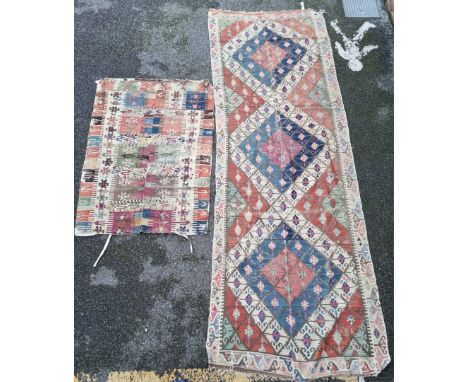 A large Kelim runner,&nbsp;433 x 153cm; together with a small Kelim rug. (2)