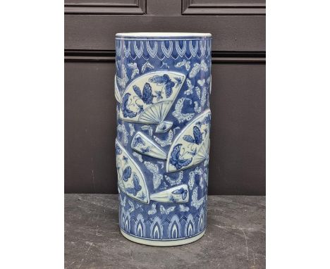 A Chinese blue and white relief moulded stick stand, 45cm high.