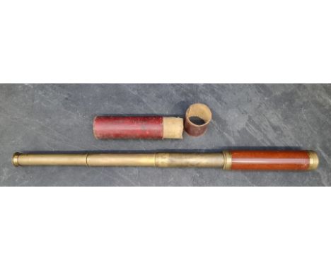 A Victorian brass and mahogany three drawer telescope,&nbsp;inscribed 'Watkins, Charing Cross, London', in remains of card bo