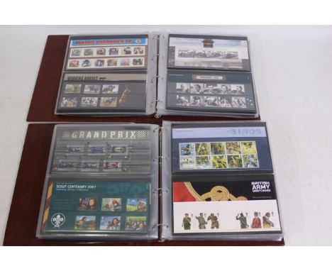 Philately - Two albums of Royal Mail Mint Stamp Presentation Packs, in excess of £450 face value.