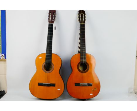 Two acoustic guitars comprising a Suzuki model # 3065 and one other. [2]