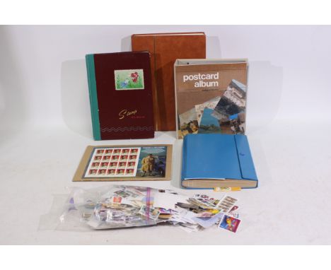 Philately - A collection of UK and foreign stamps contained in albums and loose and a quantity of PHQ cards.