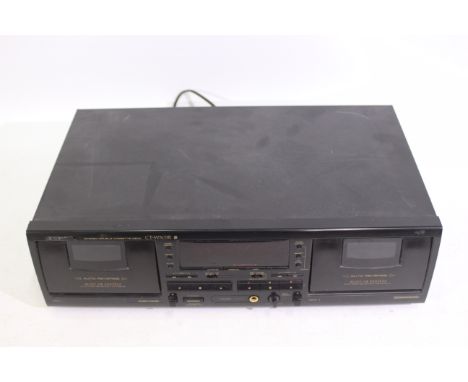 A vintage Pioneer Stereo Double Cassette Deck, model CT-W503R.