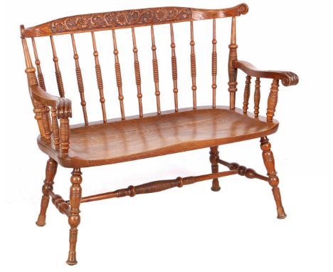 Oak 2-seater bench with twisted styles, curling motifs in the top molding and carved decor of flowers, backrest is 85 cm wide