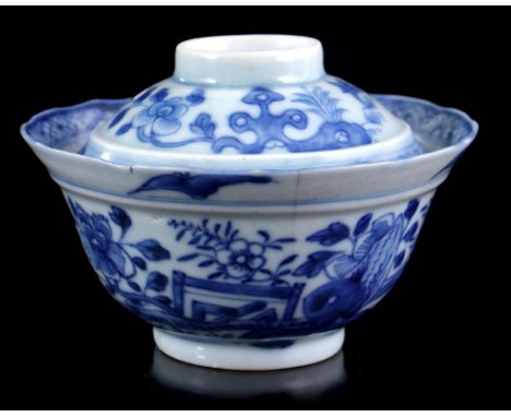 Porcelain crow's head with lid with blue and white decoration of butterflies and birds in a flower garden, China 19th century