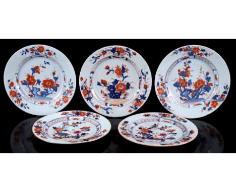 5 porcelain dishes with different Imari decor, among others. 2 with pink enamel rose, China 18th century, 23 cm diameter (var