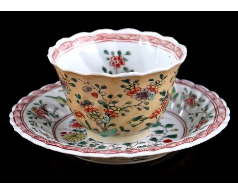 Porcelain cup and saucer with contoured rim and floral decor with cafe au lait back, marked with Lingzhi Fungus character mar
